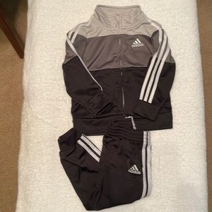 Black and gray track suit size 18m boys